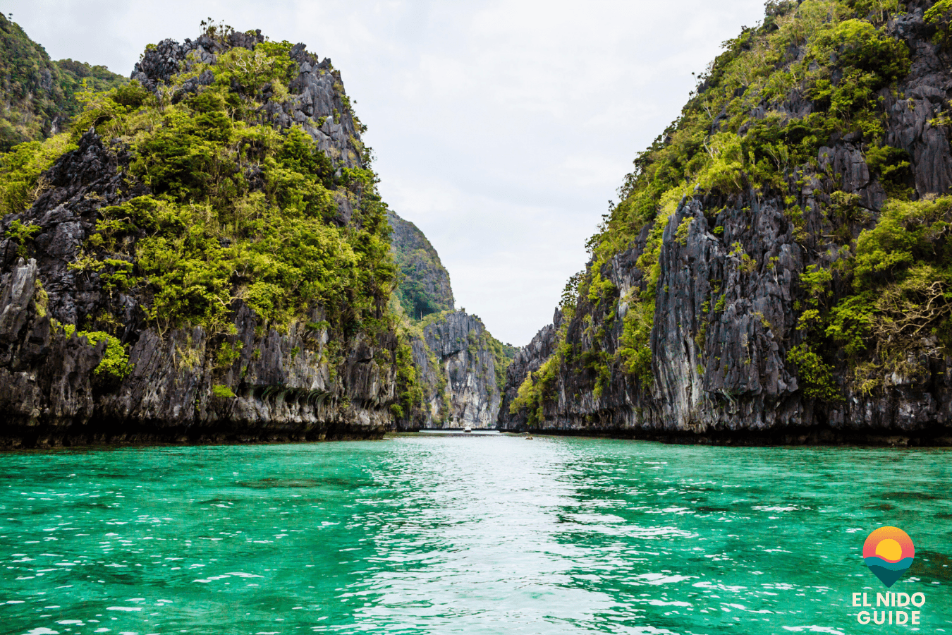 Lush green limestone karsts over Bacuit Bay, El Nido, during green season