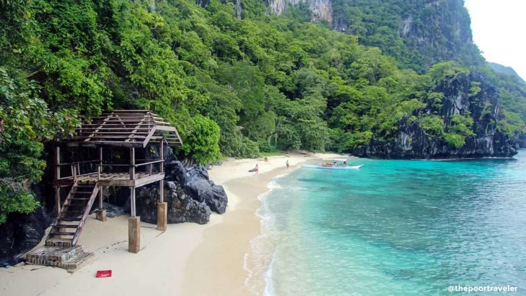 White sand beach and turquoise water at Paradise Beach, El Nido