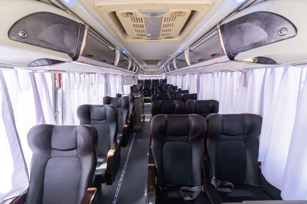 Cherry Bus Lazy Boy interior with reclining 2x1 seating